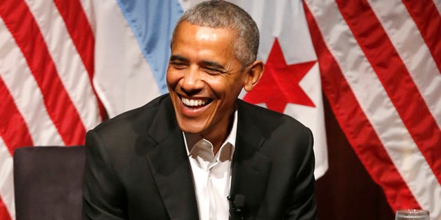 Former President Barack Obama smiles as he hosts a conversation on civic engagement and community organizing, Monday, April 24, 2017, at the University of Chicago in Chicago. It's the former president's first public event of his post-presidential life in the place where he started his political career. (AP Photo/Charles Rex Arbogast)
