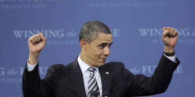 President Barack Obama gestures during his speech at Northern Michigan University in Marquette, Mich., Thursday, Feb. 10, 2011. (AP Photo/Carlos Osorio)