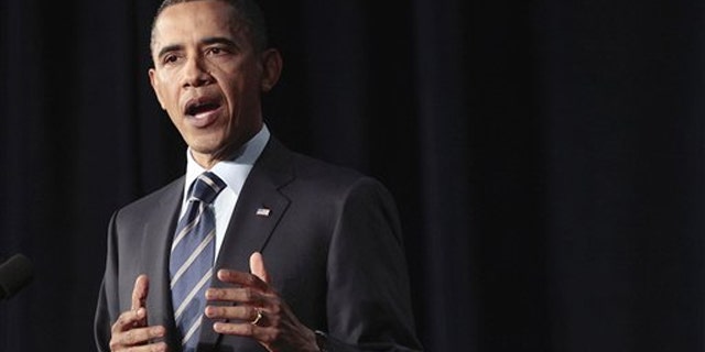 President Obama outlines his fiscal policy during an address at George Washington University in Washington April 13.