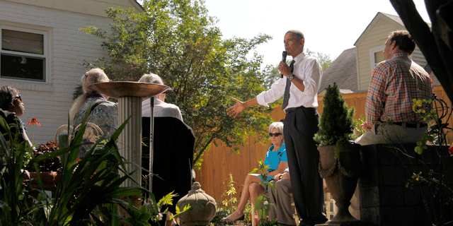 In this Sept. 22, 2010, file photo President Obama, accompanied by Health and Human Services Secretary Kathleen Sebelius, center, speaks at a private residence in Falls Church, Va. (AP)