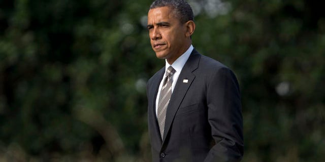 Sept. 26, 2012: President Obama walks from the Oval Office of the White House to Marine One, en route to Ohio.