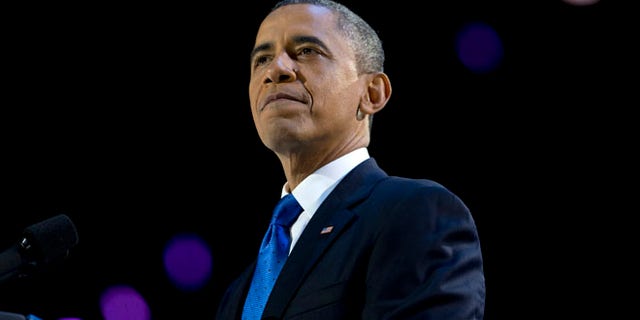 Nov. 7, 2012: President Obama pauses as he speaks at the election night party at McCormick Place in Chicago.