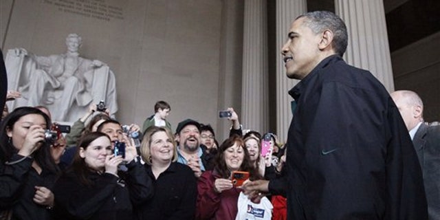 President Obama visits the Lincoln Memorial in Washington April 9.