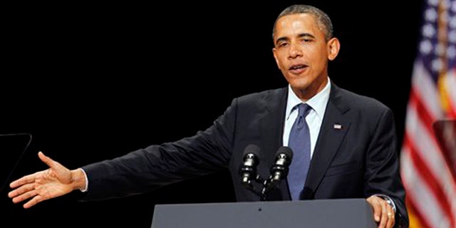 President Obama speaks to a group of supporters at a Miami fundraiser June 13.