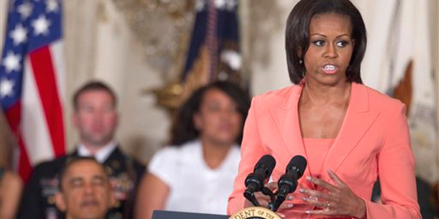 First lady Michelle Obama speaks in the East Room of the White House April 12 during the launch a national initiative to support and honor America's service members and their families.