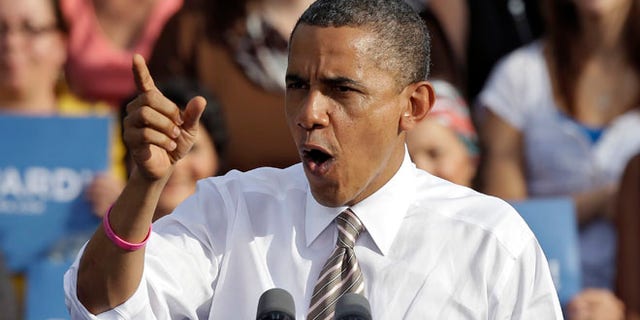 Oct. 25, 2012: President Obama gestures while speaking at a campaign event at Ybor Centennial Park in Tampa, Fla.