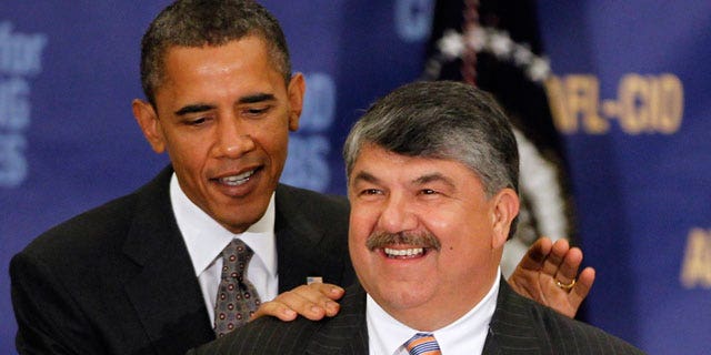 In this Aug. 4, 2010, file photo President Barack Obama stands with AFL-CIO Presidet Richard Trumka after speaking about jobs and the economy in Washington.