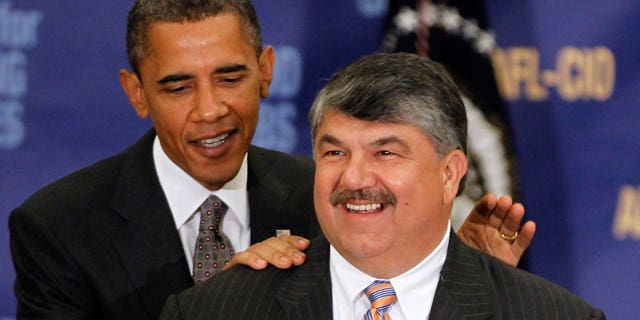 In this Aug. 4, 2010, file photo President Barack Obama stands with AFL-CIO Presidet Richard Trumka after speaking about jobs and the economy in Washington.