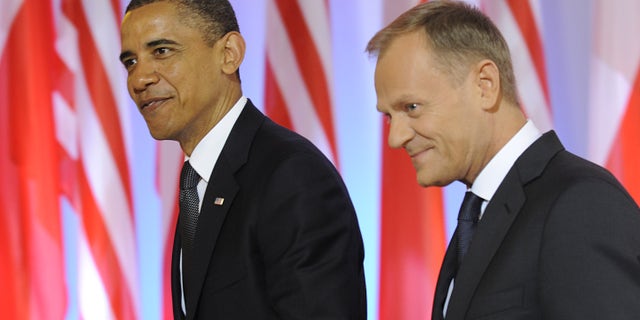 President Obama and Polish Prime Minister Donald Tusk,right, walk for talks at the Prime Minister's Chancellery in Warsaw, Poland, Saturday, May 28, 2011, on the second day of Obama's visit to Poland. (AP)