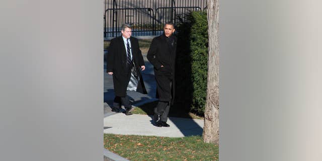 President Obama walks back to the White House after meeting with CEOs at Blair House Wednesday. (Fox News Photo)