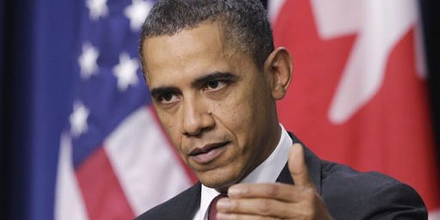 President Obama speaks about Egypt during his joint news conference with Canada's Prime Minister Stephen Harper Feb. 4.