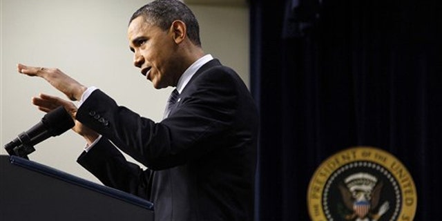 President Obama gestures during a news conference on the White House complex in Washington Feb. 15.