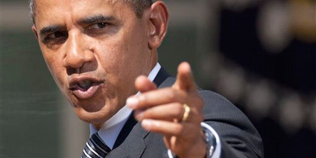 President Obama gestures after a statement in the Rose Garden of the White House in Washington Aug. 31.
