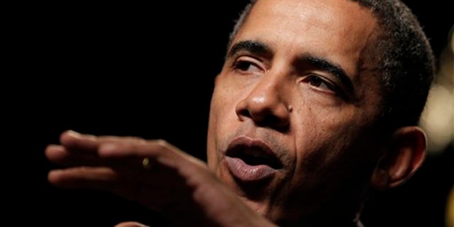 In this Aug. 16 photo, President Obama speaks at the U.S. Cellular Arena in Milwaukee. (AP Photo)