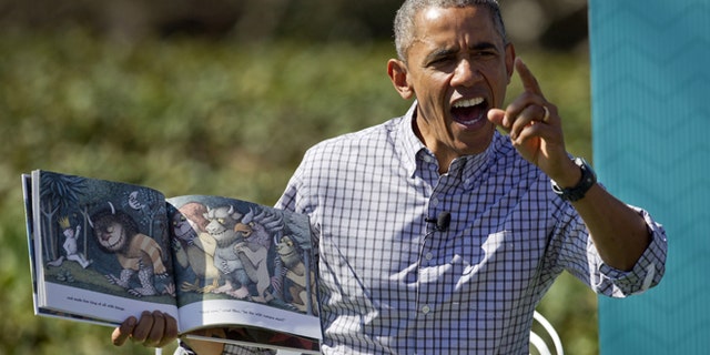 April 6, 2015: President Obama reads "Where the Wild Things Are" by Maurice Sendak, during the White House Easter Egg Roll on the South Lawn of the White House is Washington.