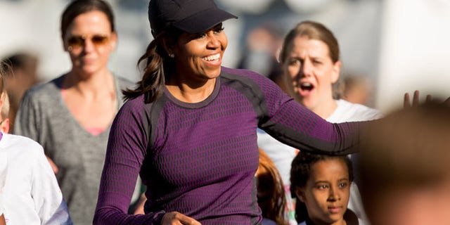 Mar. 26, 2016: First lady Michelle Obama gets greeted from the audience as she participates in her first ever "fun run" with children on the South Lawn of the the White House in Washington as part of her focus of healthy lifestyles for children.