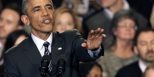 Nov. 25, 2014: President Barack Obama tries to quiet one of three hecklers as he addresses the crowd after meeting with community leaders about the executive actions he is taking to fix the immigration system.