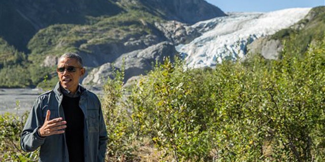 Sept. 1, 2015: President Barack Obama speaks to members of the media while on a hike to the Exit Glacier in Seward, Alaska, which according to National Park Service research, has retreated approximately 1.25 miles over the past 200 years.