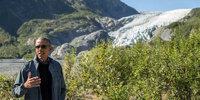 Sept. 1, 2015: President Barack Obama speaks to members of the media while on a hike to the Exit Glacier in Seward, Alaska, which according to National Park Service research, has retreated approximately 1.25 miles over the past 200 years.