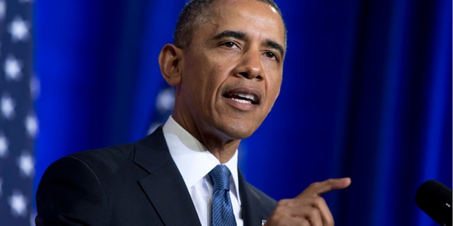 FILE: Jan. 17, 2014: President Barack Obama speaks at the Justice Department in Washington, D.C.