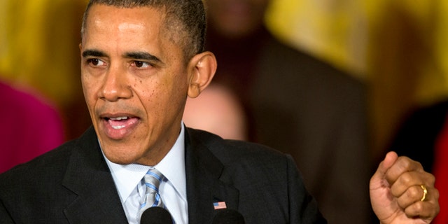 Feb. 11, 2014: President Barack Obama speaks about raising the minimum wage for federal contract workers during a ceremony in the East Room of the White House in Washington.