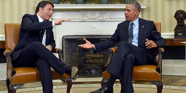 April 17, 2015: President Obama reaches to shake hands with Italian Prime Minister Matteo Renzi in the Oval Office.