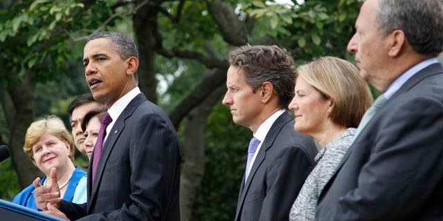 Sept. 3: President Barack Obama, center, delivers a statement on monthly jobs number in Rose Garden of the White House in Washington. From left are, outgoing Council of Economic Advisers Chair Christina Romer, Commerce Secretary Gary Locke, Labor Secretary Hilda Solis, the president, Treasury Secretary Timothy Geithner, Small Business Administrator Karen G. Mills and National Economic Council Director Lawrence Summers.
