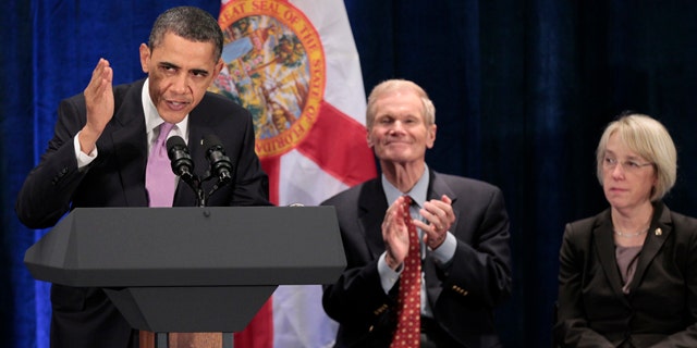 March 4, 2011: President Barack Obama, left, with Sen. Bill Nelson, D-Fla., center, and Sen. Patty Murray, D-Wash., right, during a Democratic fundraiser at Fontainebleau Resort.