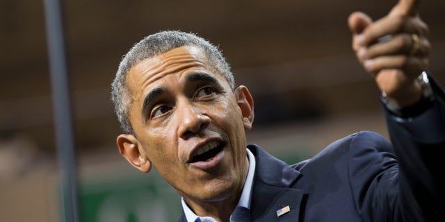 Oct. 19, 2014: President Obama delivers remarks during a campaign rally at Chicago State University.