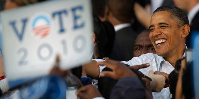 Oct. 10: President Barack Obama meets with members of the audience during a rally in Philadelphia.
