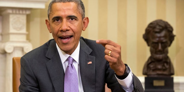 March 3, 2015: President Barack Obama speaks about Iran and Israeli Prime Minister Benjamin Netanyahu's speech to Congress during a meeting with Defense Secretary Ash Carter in the Oval Office of the White House in Washington.