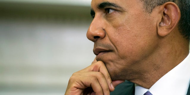 July 7, 2015: President Obama listens as Vietnamese Communist party secretary general Nguyen Phu Trong speaks in the Oval Office of the White House in Washington.