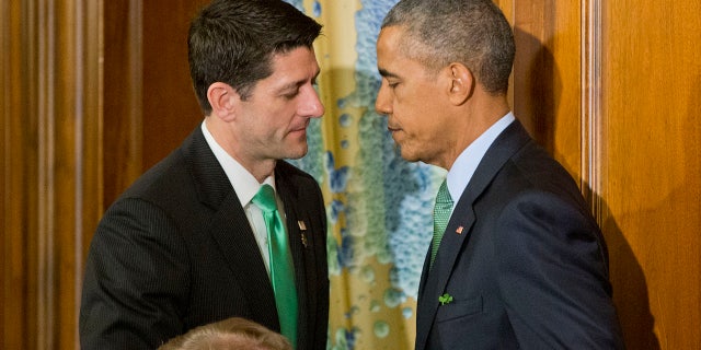 March 15, 2016: President Barack Obama, right, and House Speaker Paul Ryan of Wis., left, shake hands during a lunch celebrating St. Patrick's Day on Capitol Hill in Washington. (AP Photo/Pablo Martinez Monsivais)