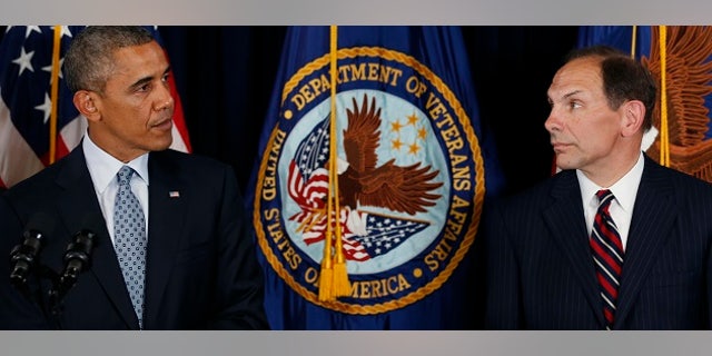 U.S. President Barack Obama announces his choice of former Procter & Gamble Chief Executive Bob McDonald, (R) an Army veteran, as his nominee to be the next secretary of veterans affairs at the VA in Washington June 30, 2014. If confirmed by the Senate, McDonald would be tasked with repairing the Veterans Administration after widespread evidence of delays in military veterans getting healthcare at VA facilities. REUTERS/Kevin Lamarque (UNITED STATES - Tags: POLITICS MILITARY HEALTH) - RTR3WJ27