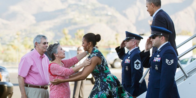 June 13, 2014: President Barack Obama and first lady Michelle Obama, are greeted on the tarmac by Sen. Barbara Boxer, D-Calif., second from left, and her husband Stewart Boxer, left, as they arrive in Palm Springs, Calif. (AP)