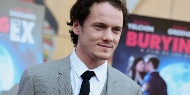 FILE - In this June 11, 2015, file photo, Anton Yelchin arrives at a special screening of "Burying the Ex" held at Grauman's Egyptian Theatre in Los Angeles. Yelchin, a charismatic and rising actor best known for playing Chekov in the new "Star Trek" films, has died at the age of 27. He was killed in a fatal traffic collision early Sunday morning, June 19, 2016, his publicist confirmed. (Photo by Richard Shotwell/Invision/AP, File)