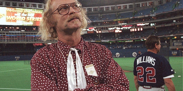 Oct. 23, 1992: Canadian author W.P. Kinsella stands on the field before game five of the World Series between the Toronto Blue Jays and Atlanta Braves at SkyDome in Toronto, Ontario. Kinsella, the author of "Shoeless Joe," the award-winning novel that became the film "Field of Dreams," has died at 81.