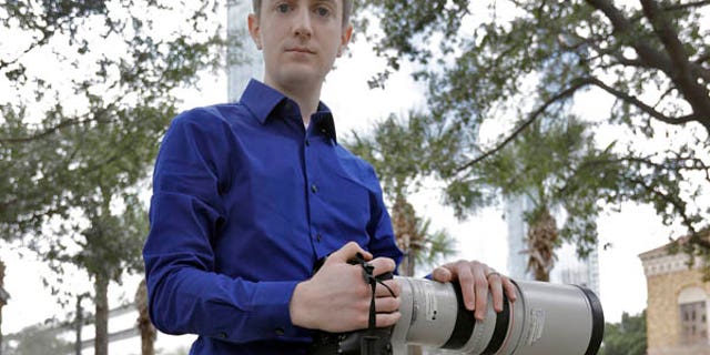 In this photo taken Feb 9, 2017, Mike Schwarz, sole proprietor of Mike Schwarz Photography, poses for a photo in Tampa, Fla. Schwarz is a self-employed business owner who buys his own health insurance. The subsidized coverage Obamacare offers provides him protection from lifes unpredictable changes and freedom to pursue his vocation, he says. (AP Photo/Chris O'Meara)