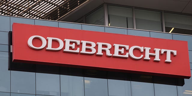 A sign of the Odebrecht Brazilian construction conglomerate is seen at their headquarters in Lima, Peru.