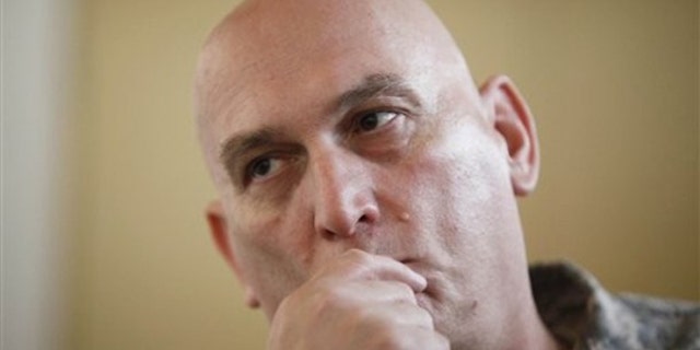 Gen. Ray Odierno talks to a reporter during a visit to soldiers at Forward Operating Base Cobra in the Diyala province, Iraq, Jan. 2. (AP Photo)