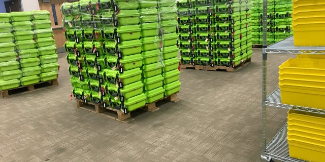 Containers for secure ballot handling sit on pallets at the Franklin County Board of Elections in Columbus, Ohio, Dec. 14, 2017.