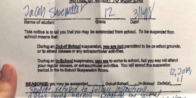 An Ohio high school student was suspended for staying in the classroom during the National Walkout Day.