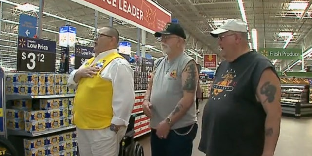 Walmart greeter Freddy Davidson takes the extra step to honor veterans at the store in Chadron, Ohio.