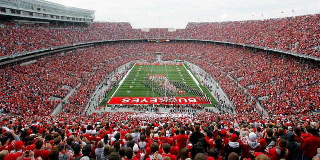 File photo - The Ohio State University football team takes the field prior to the start of their NCAA football game against the University of Illinois in Columbus, Ohio, Nov. 10, 2007. (REUTERS/Matt Sullivan)