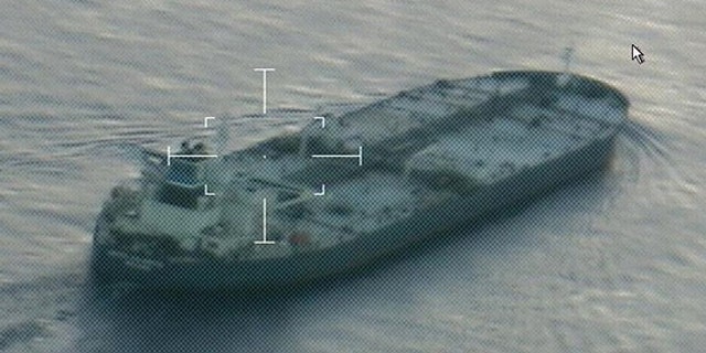 July 25, 2014: A still image from video taken by a U.S. Coast Guard aircraft shows the oil tanker United Kalavrvta approaching Galveston, Texas. (Reuters)