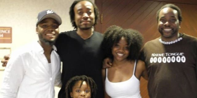 Okera Ras (far right) and son Duro Akil (second from the left) with family members.