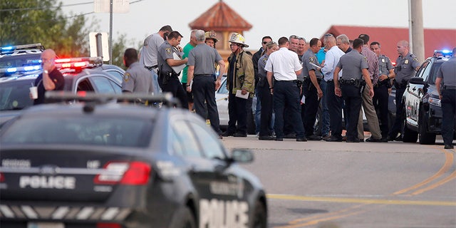May 24, 2018: Police and emergency personnel surround the scene of the shooting at Lake Hefner in Oklahoma City.