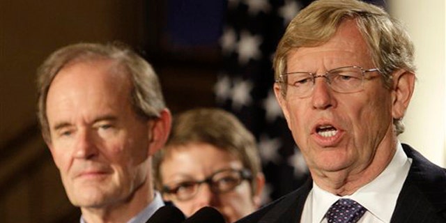 Attorney Theodore Olson, right, speaks next to attorney David Boies at a news conference in San Francisco Aug. 4. (AP Photo)