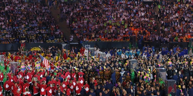 Team USA arrives during the opening ceremony.