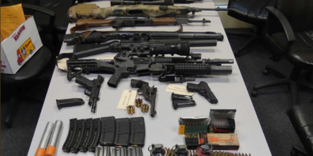 Massachusetts authorities posted a picture on Twitter showing a weapons stockpile discovered at a Boston-area hotel.